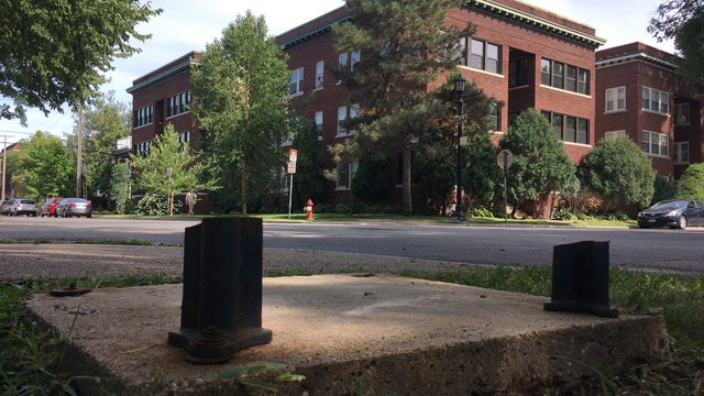 Blue USPS mailbox unbolted from the ground and stolen from Minneapolis intersection