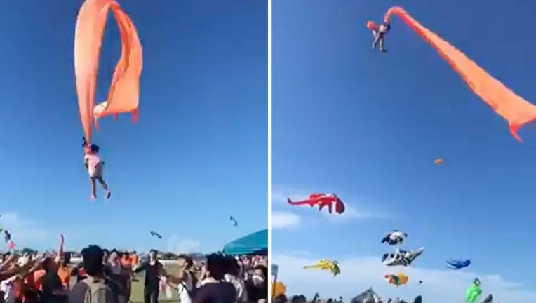 A 3-year-old girl was lifted into the air by a large kite during a kite festival in Hsinchu, northern Taiwan, on Sunday. The wind slowed down and the girl was safely recovered by adults on the ground. (Credit: Dainese Hsu)