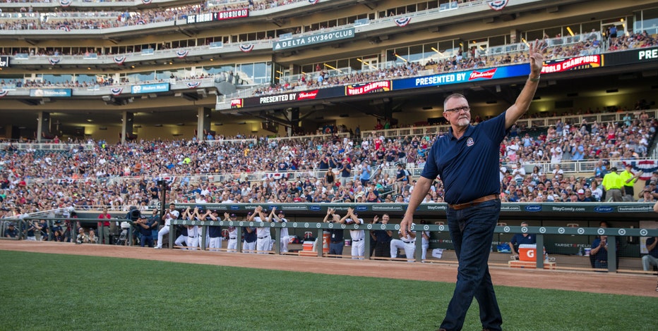 Minnesota Twins Hall of Fame pitcher Bert Blyleven throws out the  ceremonial first pitch before the Major League Baseball game against the Texas  Rangers at the Rangers Ballpark in Arlington, Texas on