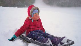 Kids call early snow 'natural Minnesota' and a 'magical day'