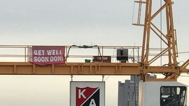 Get well banner unfurled for burn victim outside Minneapolis hospital