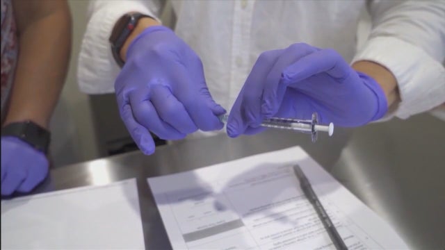 Johnson & Johnson COVID-19 vaccine trial to resume as pressure mounts