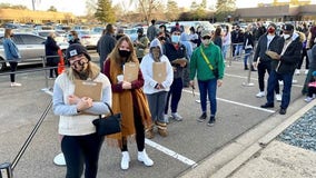 Wait times swell up to 3 hours outside Minneapolis early vote centers