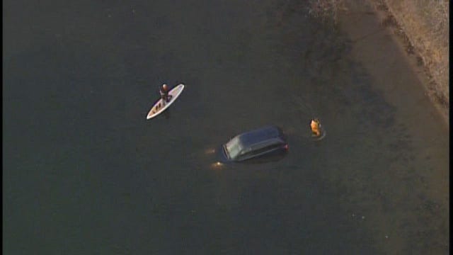 Vehicle hits jogger, drives into Lake Harriet in Minneapolis