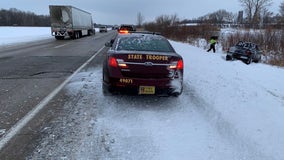 Truck slides off I-94 near Monticello, nearly hits state troopers