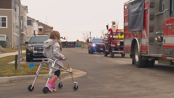Santa makes special visit, riding a fire truck to see young girl in Victoria, Minnesota