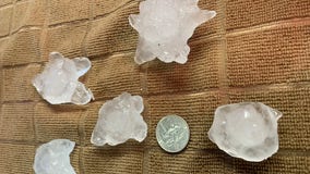 Snow, tornado warnings and hail make for strange spring day in Minnesota