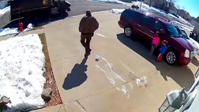 UPS driver joins kids for game of hopscotch after delivering package in Rochester, Minn.