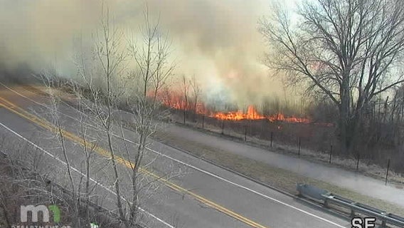 Grass fire burns along I-35W in Lino Lakes, possibly started by cigarette