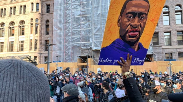 Activists lead march through downtown Minneapolis on eve of Chauvin trial