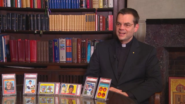 Minnesota priest to sell prized baseball card collection for good cause