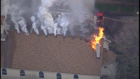 Parishioners gather for Sunday mass after fire destroys Minneapolis church