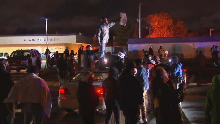 protester on car Daunte Wright rally
