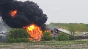 Fiery train derailment prompts evacuation of small Iowa town