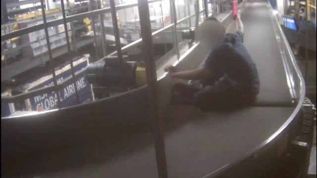Video: Boy rides on MSP Airport baggage conveyor belt