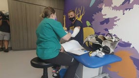 Former college pitcher fitted for new prosthetic arm after theft