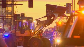 Crews remove barricades in Uptown, protesters arrested