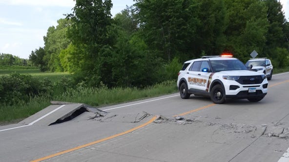 Section of Old Highway 169 buckles due to heat near Belle Plaine