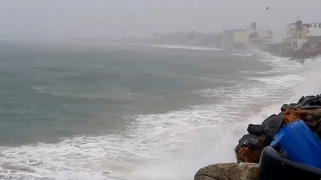 Hurricane Enrique sweeps past Mexico’s southwestern coast