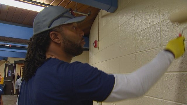 NFL star and Twin Cities native Larry Fitzgerald helps fix up Minneapolis Boys and Girls Club branch
