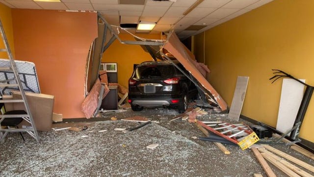 Vehicle crashes into empty suite at St. Paul strip mall