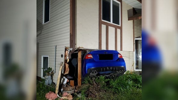 Man learning to drive stick shift crashes car into St. Paul home