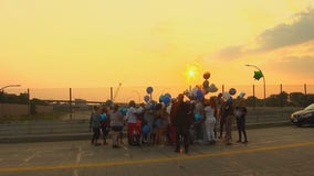 Family releases balloons to remember baby killed in Brooklyn Center crash