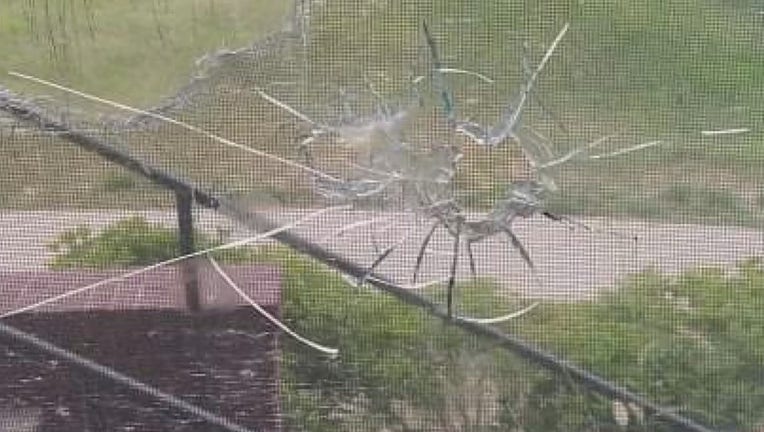 bullet hole in window