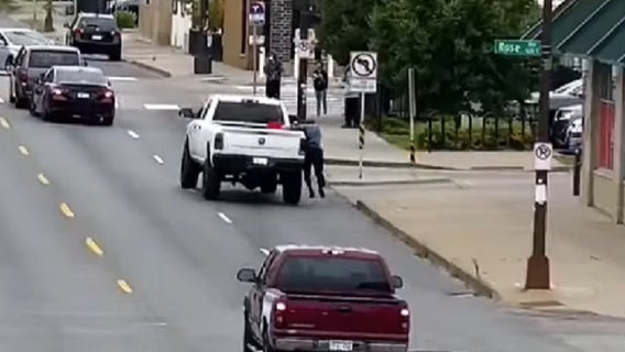 Video: St. Paul police searching for driver who dragged officer during chase