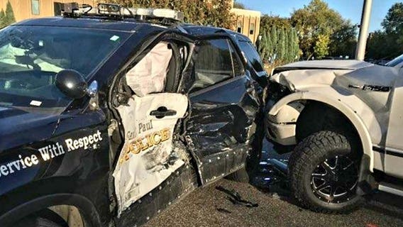 St. Paul man charged after ramming into squad car with officer inside