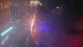 Christmas tree set on fire outside Fox News Channel