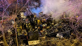 Minneapolis firefighters knock down flames at homeless encampment