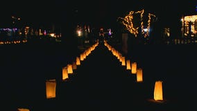 Thousands of luminaries light up Hopkins neighborhood on Christmas Eve