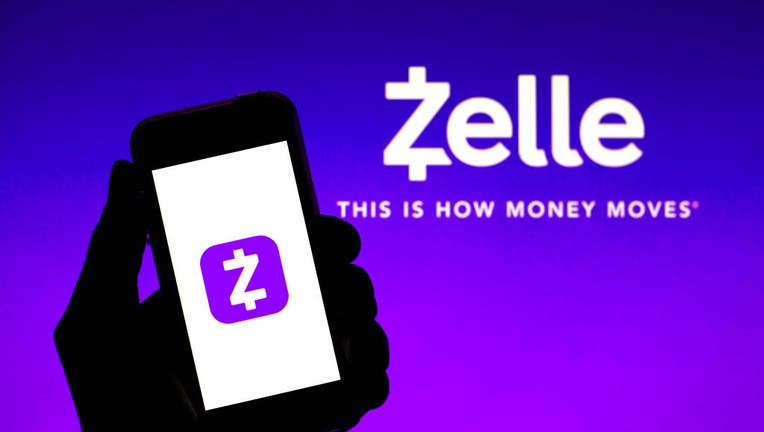 In this photo illustration a Zelle logo seen displayed on a