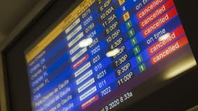 Travelers face more canceled flights on New Year's Day
