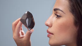 'Extremely rare' 555.55-carat black diamond going up for auction