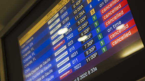 Travelers face more canceled flights on New Year's Day