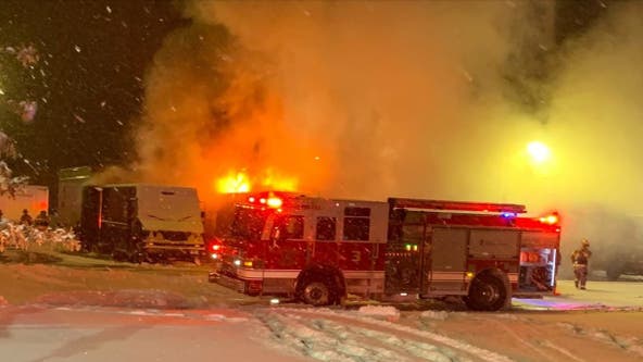 Firefighters extinguish flames at UPS warehouse in Rochester, Minn.