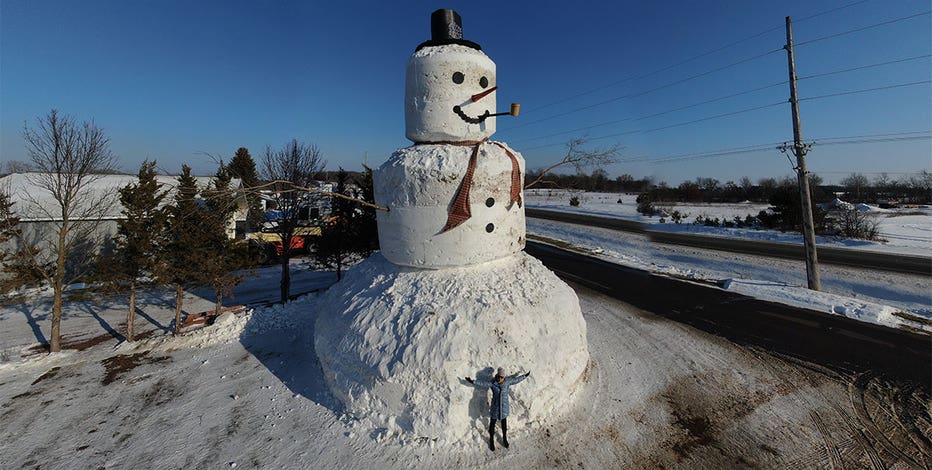 Family builds more than 40 foot tall, super-sized snowman in Milltown, Wis.