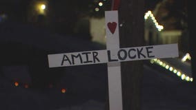 Protesters erect crosses during Minneapolis rally for Amir Locke