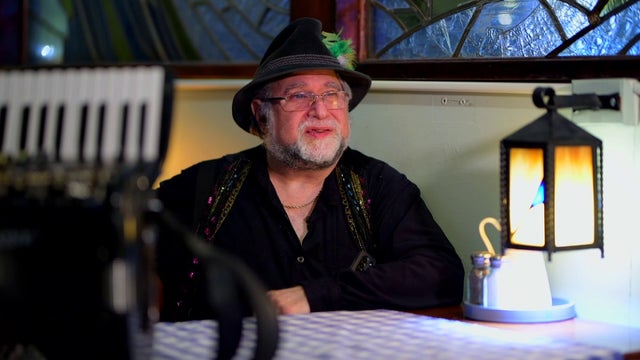 Strolling musician makes living playing accordion in Minneapolis