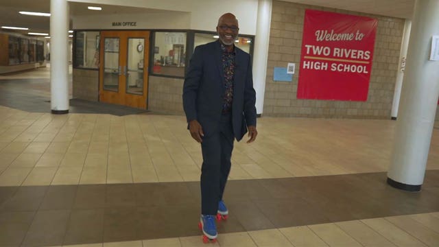 Roller skating principal builds authentic connections at Two Rivers High School