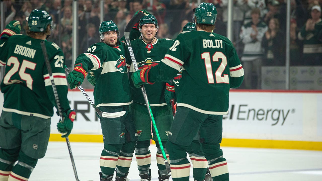 Minnesota Wild clinch playoff spot after beating Sharks 5-4 in OT