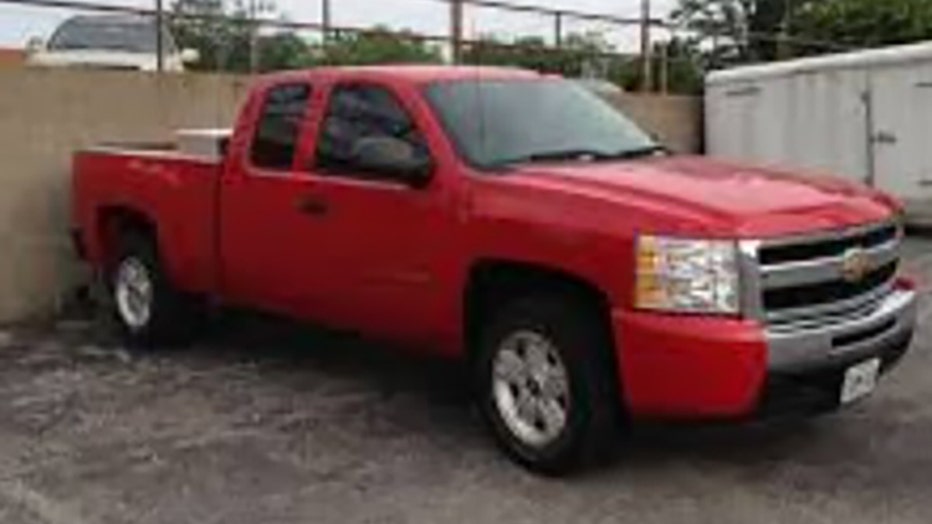 9ded4805-2009RedChevySilverado.jpg