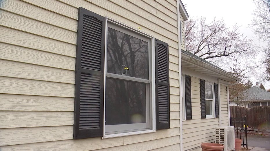 Bullet home in neighbor's window