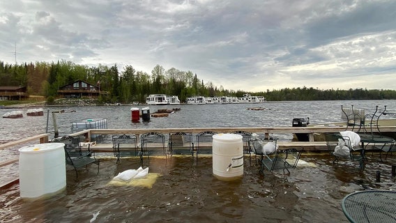 Storms halt sandbagging efforts in northern Minnesota as flood waters rise