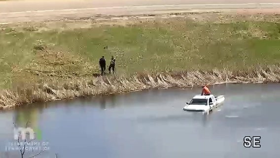 VIDEO: Man rescued after crashing into Lakeville pond