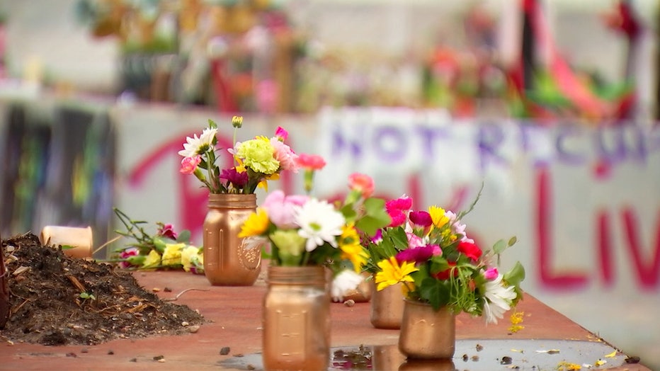 Flowers at the center of George Floyd Square during the Rise to Remember festival on Saturday, May 28, 2022.
