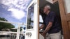 After 14 years Minnesota man sets sail in homemade houseboat