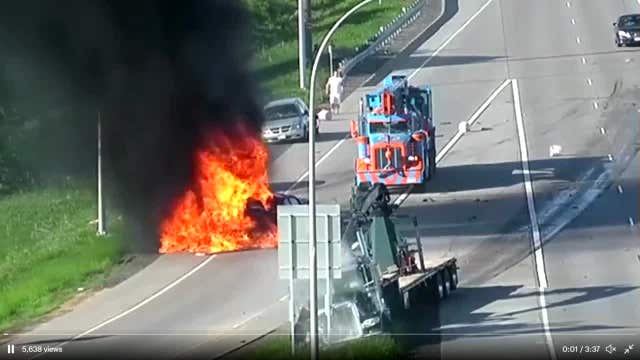 Video: Pick-up truck bursts into flames after being hit by semi on I-35